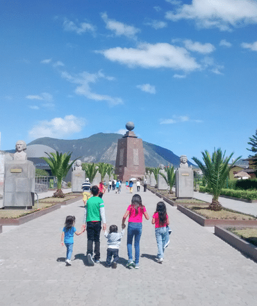 family at Mitad del Mundo, Ecuador